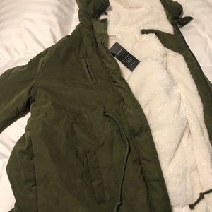 Jacket, fleece lined with hood.